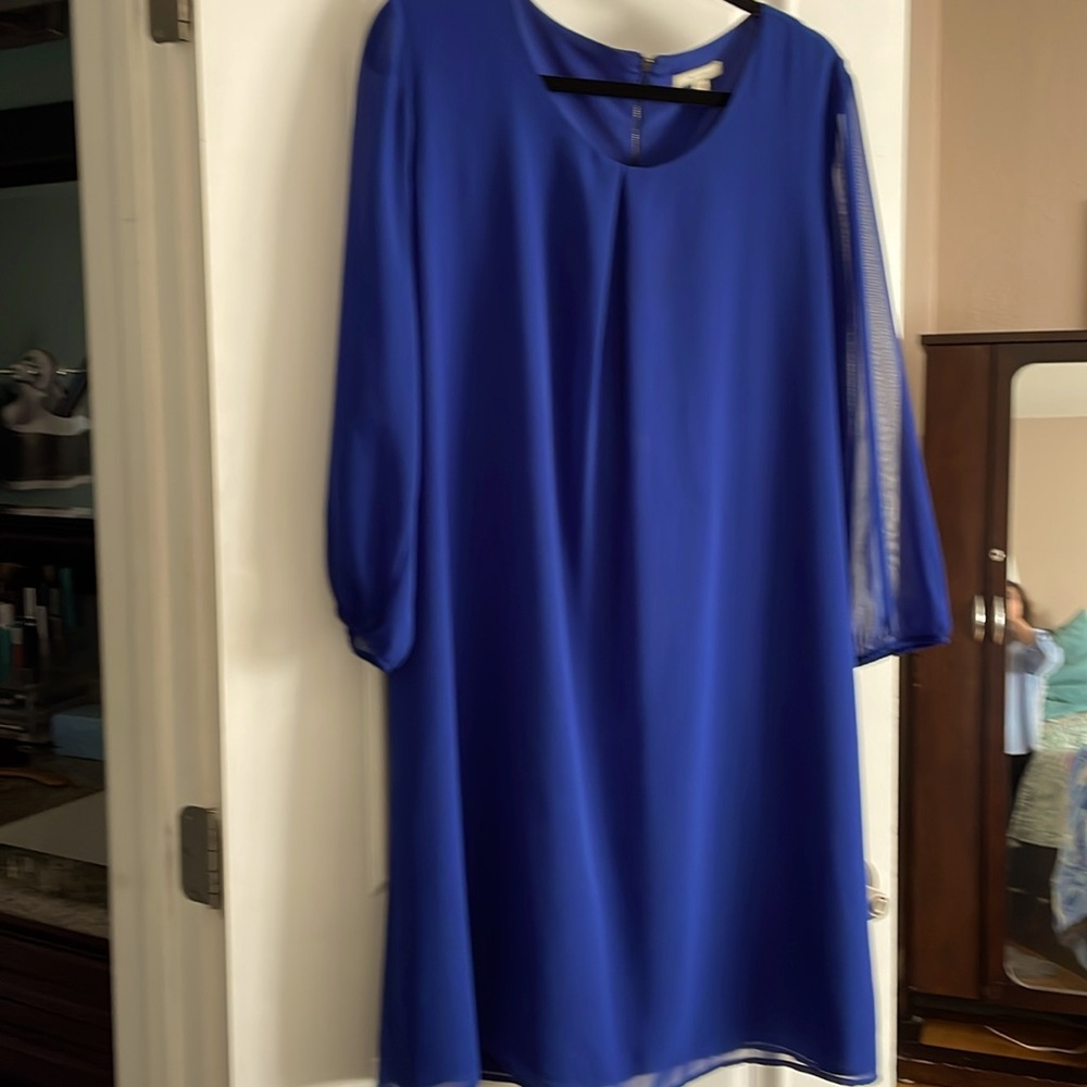 Royal blue dress size Xl. Sheer sleeves. Short black zipper in back.